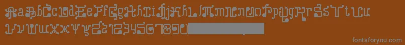 フォントTurkAndNusa – 茶色の背景に灰色の文字