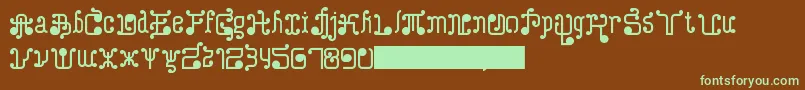 フォントTurkAndNusa – 緑色の文字が茶色の背景にあります。