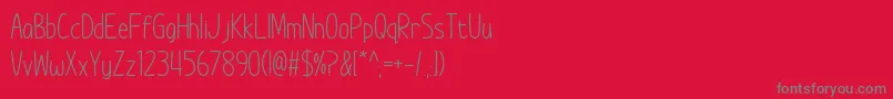 ImWunderlandSpacedOut Font – Gray Fonts on Red Background