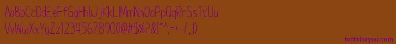 Шрифт ImWunderlandSpacedOut – фиолетовые шрифты на коричневом фоне