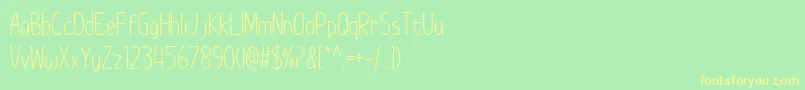 Шрифт ImWunderlandSpacedOut – жёлтые шрифты на зелёном фоне