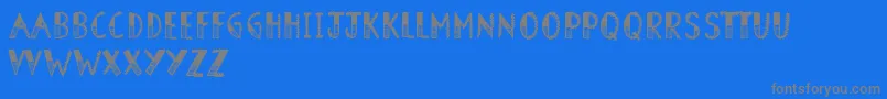 フォントBarnOwl – 青い背景に灰色の文字
