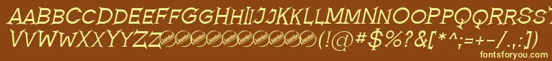 RomanicumItalic-fontti – keltaiset fontit ruskealla taustalla