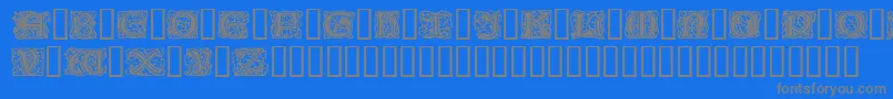 ChaucerianInitials-Schriftart – Graue Schriften auf blauem Hintergrund