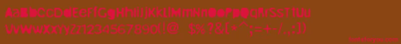 UnrulyRegular Font – Red Fonts on Brown Background