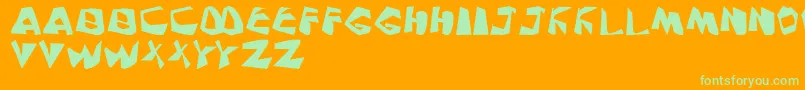 PinkNoise-Schriftart – Grüne Schriften auf orangefarbenem Hintergrund