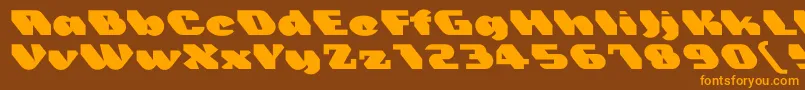 フォントTrez – オレンジ色の文字が茶色の背景にあります。