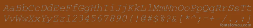 Czcionka CourierkoicttItalic – szare czcionki na brązowym tle