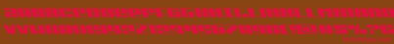 フォントMichiganleft – 赤い文字が茶色の背景にあります。