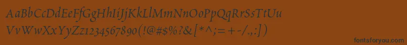 フォントPoeticastd – 黒い文字が茶色の背景にあります