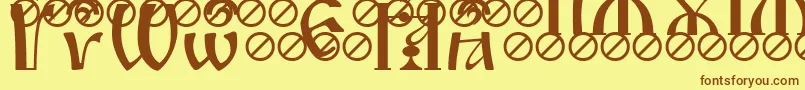 IrmologionBrthcircumflex Font – Brown Fonts on Yellow Background