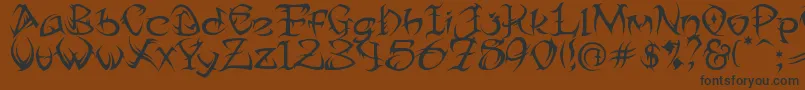 Tribtwo-Schriftart – Schwarze Schriften auf braunem Hintergrund