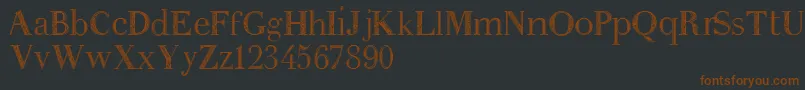 Anakatrinatan-Schriftart – Braune Schriften auf schwarzem Hintergrund