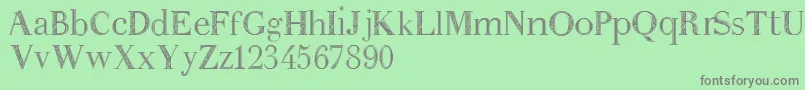 Anakatrinatan Font – Gray Fonts on Green Background