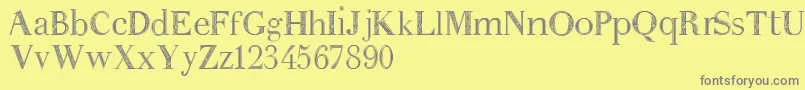 Weitere Informationen zur Anakatrinatan-Schriftart Anakatrinatan-Schriftart – Graue Schriften auf gelbem Hintergrund