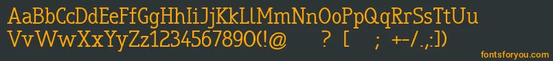 Шрифт TrueboSerif – оранжевые шрифты на чёрном фоне