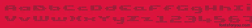 UpTinyLcdFourLight Font – Black Fonts on Red Background