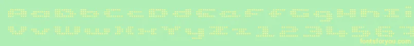 UpTinyLcdFourLight Font – Yellow Fonts on Green Background