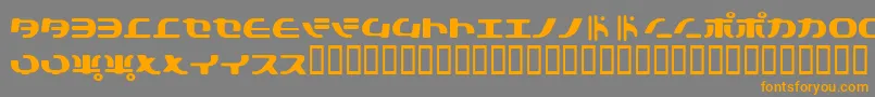 フォントTokyosoft – オレンジの文字は灰色の背景にあります。