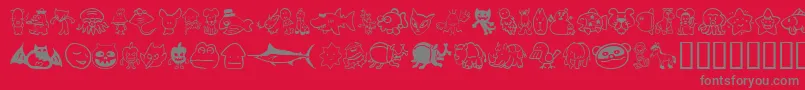 Sakabe Animal02-fontti – harmaat kirjasimet punaisella taustalla