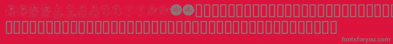 フォントKrLilWeenDings – 赤い背景に灰色の文字
