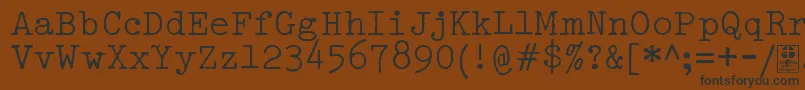 fuente TypowriterDistressedDemo – Fuentes Negras Sobre Fondo Marrón