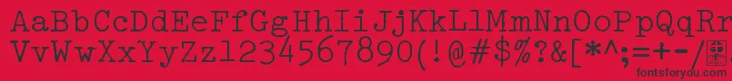 Шрифт TypowriterDistressedDemo – чёрные шрифты на красном фоне