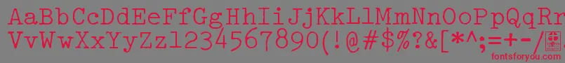 フォントTypowriterDistressedDemo – 赤い文字の灰色の背景