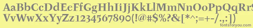 TyfaitcTtРџРѕР»СѓР¶РёСЂРЅС‹Р№-Schriftart – Graue Schriften auf gelbem Hintergrund