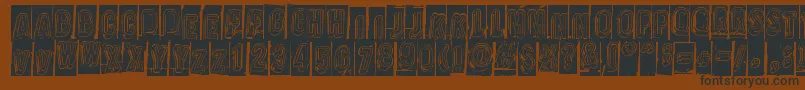 Oravanpyora Font – Black Fonts on Brown Background