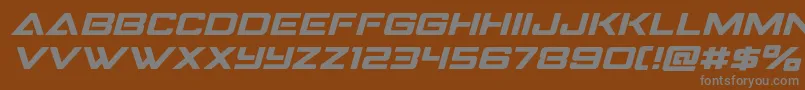 フォントStrikefighterexpandital – 茶色の背景に灰色の文字