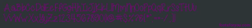 Czcionka MissSmartyPants – fioletowe czcionki na czarnym tle