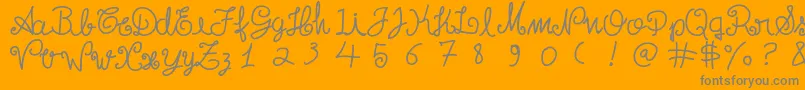 Escritatoska-Schriftart – Graue Schriften auf orangefarbenem Hintergrund