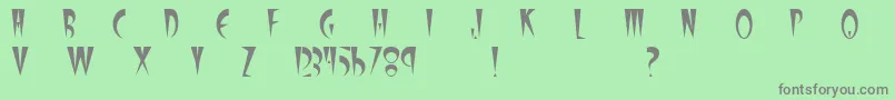 フォントStilletoPlain – 緑の背景に灰色の文字