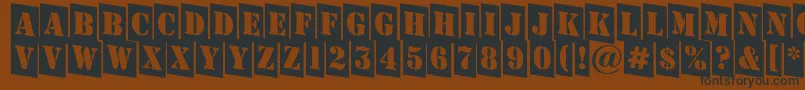 Fonte AStampercmdn – fontes pretas em um fundo marrom