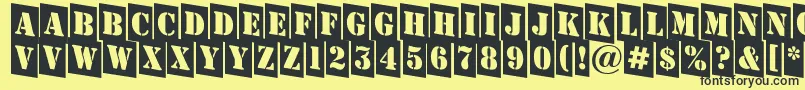 Шрифт AStampercmdn – чёрные шрифты на жёлтом фоне