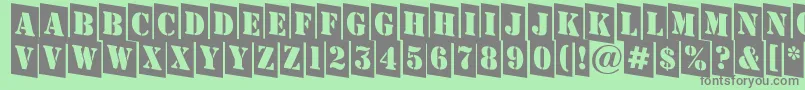 AStampercmdn Font – Gray Fonts on Green Background