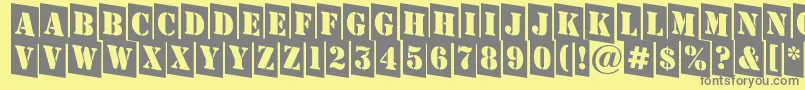 AStampercmdn Font – Gray Fonts on Yellow Background