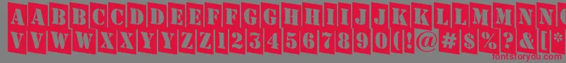 AStampercmdn-Schriftart – Rote Schriften auf grauem Hintergrund