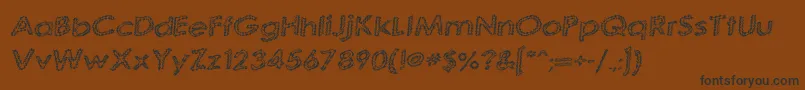 QuaverlyG98 Font – Black Fonts on Brown Background