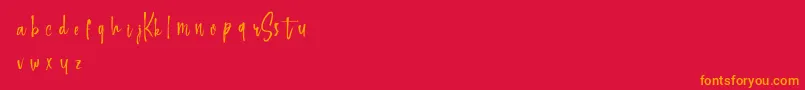 Fonte Keepscrollingdemo – fontes laranjas em um fundo vermelho