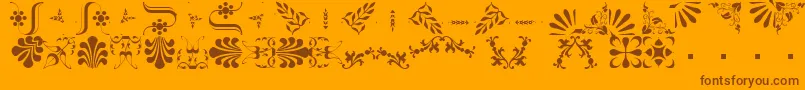BorderbatsFleur2Regular-Schriftart – Braune Schriften auf orangefarbenem Hintergrund