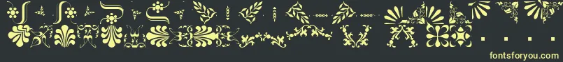 Więcej informacji o czcionce BorderbatsFleur2Regular Czcionka BorderbatsFleur2Regular – żółte czcionki na czarnym tle