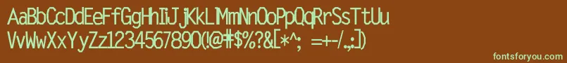 フォントMorker – 緑色の文字が茶色の背景にあります。