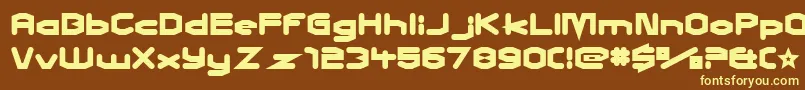 CharlesInCharge-fontti – keltaiset fontit ruskealla taustalla