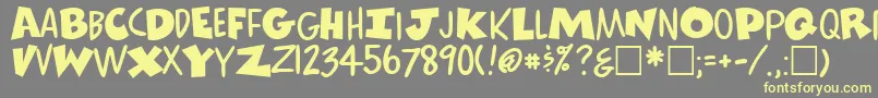 ComicsRegular Font – Yellow Fonts on Gray Background