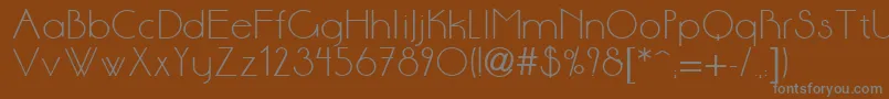 Anson-fontti – harmaat kirjasimet ruskealla taustalla