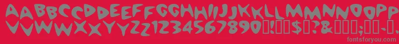 CheappizzaHeavy-fontti – harmaat kirjasimet punaisella taustalla