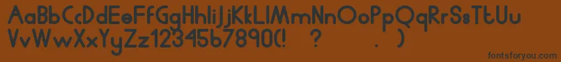 Humanp.JChubby Font – Black Fonts on Brown Background