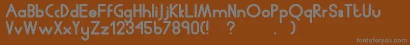 Humanp.JChubby Font – Gray Fonts on Brown Background